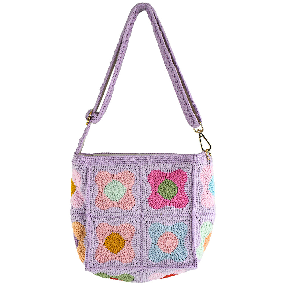 A handmade crochet shoulder bag with a lavender base and colorful floral square patterns. The bag features an adjustable and detachable strap, a soft texture, and a spacious interior, perfect for daily use or casual outings.