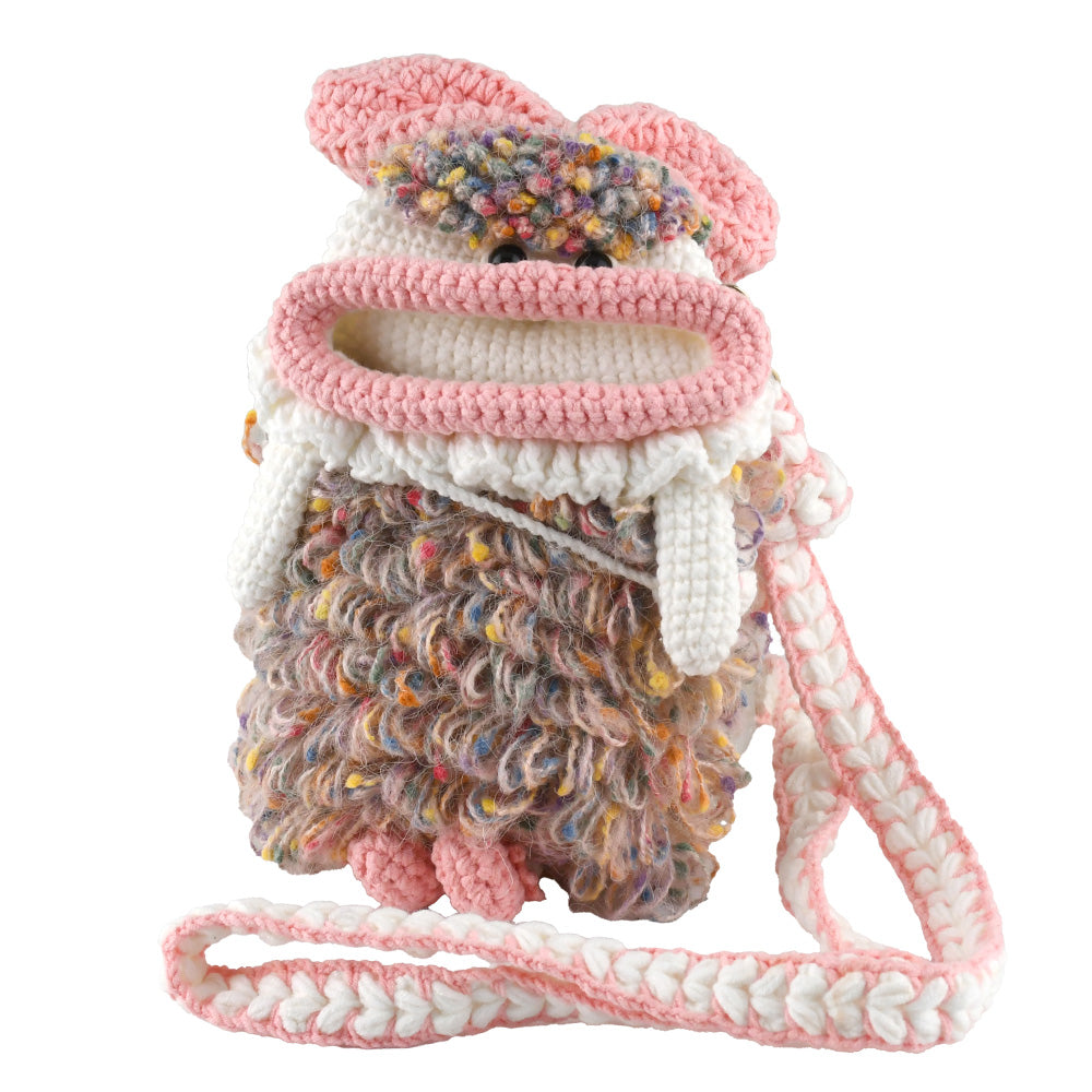 Handcrafted pink crochet doll crossbody phone pouch with zipper closure and cute facial details
