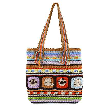 Handwoven colorful bag with cartoon animal patterns (tiger, paw prints) and vibrant striped design. Made of soft fabric, perfect for daily use or shopping.