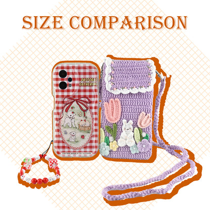 Purple crochet phone pouch with pink tulips, white bunny, and pastel flowers, featuring braided shoulder strap
