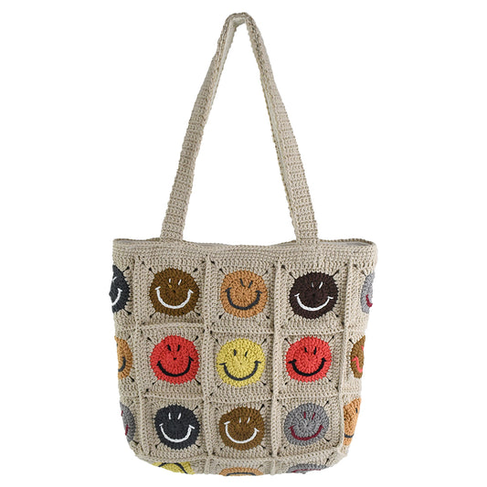 Handmade crochet tote bag with colorful smiley face patterns, featuring a beige base and sturdy knitted straps. Lightweight and spacious, perfect for casual outings, shopping, or daily use.