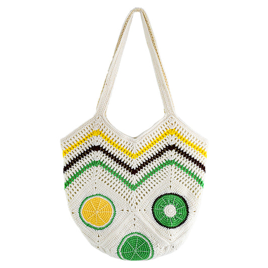 Handmade crochet tote bag with vibrant citrus patterns, featuring a beige base and colorful yellow, green, and brown details. Lightweight, eco-friendly, and perfect for summer beach outings or daily use.