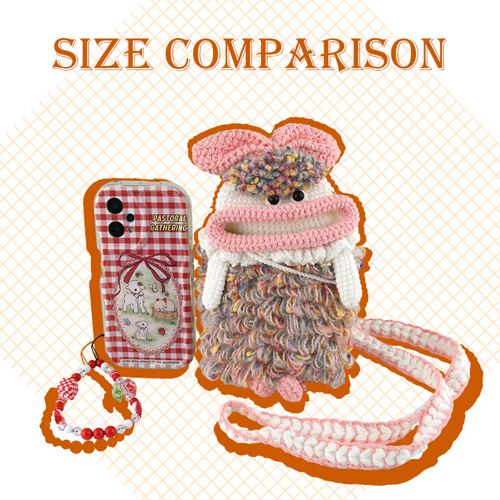 Handcrafted pink crochet doll crossbody phone pouch with zipper closure and cute facial details
