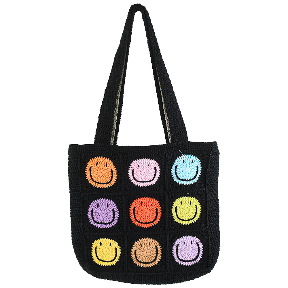 Handmade black crochet tote bag featuring colorful 3D clown patchwork squares, with a lightweight and durable design. Perfect for shopping, daily use, or gifting.