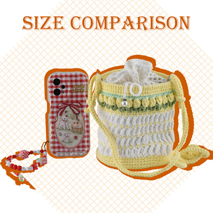 Handmade crochet bucket bag in white and yellow with pearl details, drawstring closure and adjustable shoulder strap
