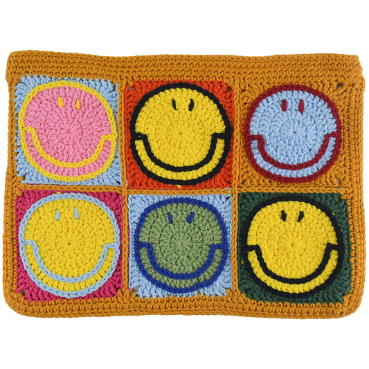 Handmade crochet clutch bag featuring colorful smiling face motifs in pink, yellow, blue, green, red, and orange squares. Lightweight, eco-friendly, and compact design with a secure zipper closure.