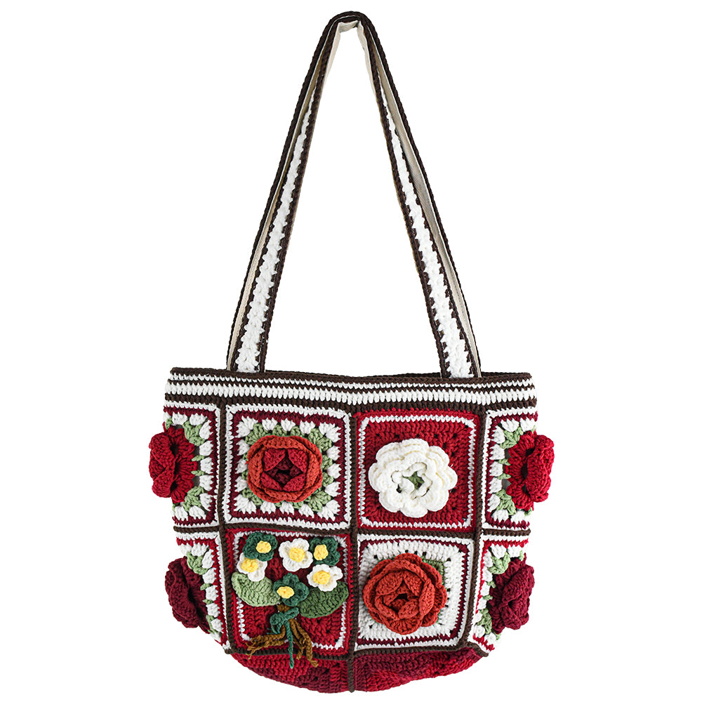 Handmade crochet tote bag featuring vibrant 3D floral patchwork in red, white, and green. Perfect for shopping, daily use, or as a stylish accessory.