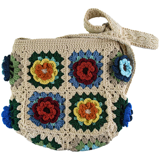 Handmade crochet tote bag featuring a colorful 3D floral design. Beige base with red, blue, green, and yellow flower accents. Lightweight, spacious, and perfect for shopping or casual outings.