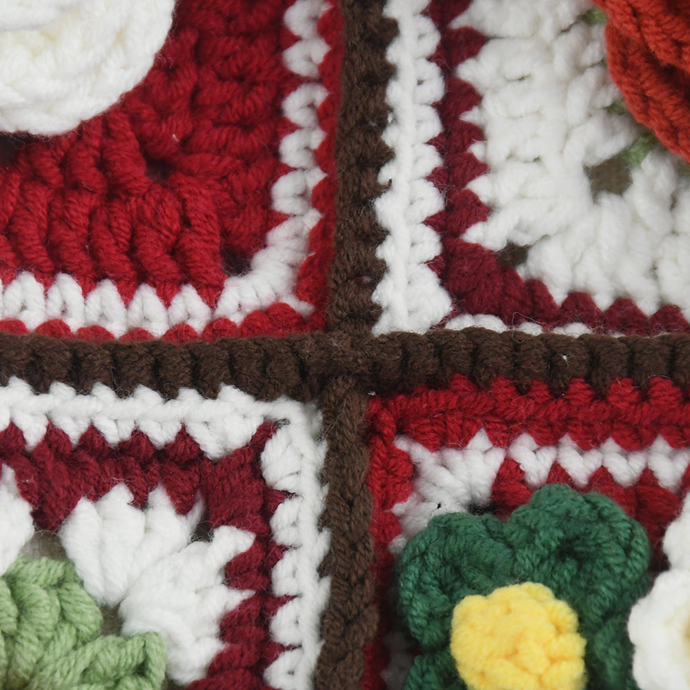 Handmade crochet tote bag featuring vibrant 3D floral patchwork in red, white, and green. Perfect for shopping, daily use, or as a stylish accessory.