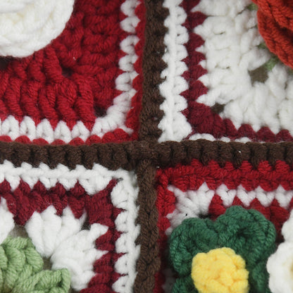 Handmade crochet tote bag featuring vibrant 3D floral patchwork in red, white, and green. Perfect for shopping, daily use, or as a stylish accessory.