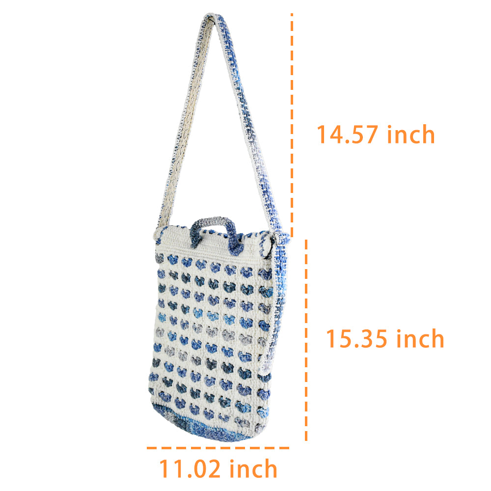 Handmade crochet shoulder bag with a unique blue and white floral pattern, featuring an adjustable strap and secure flap closure. Lightweight and perfect for everyday use.