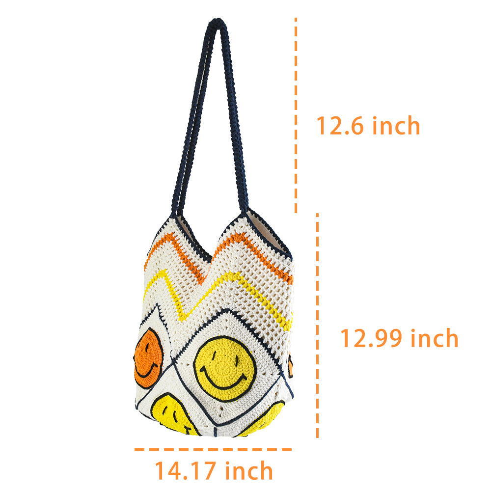 Handmade crochet tote bag with a white base, colorful chevron pattern, and three smiley face designs in orange, yellow, and navy. Features a soft navy strap and a spacious interior, perfect for casual outings or travel.