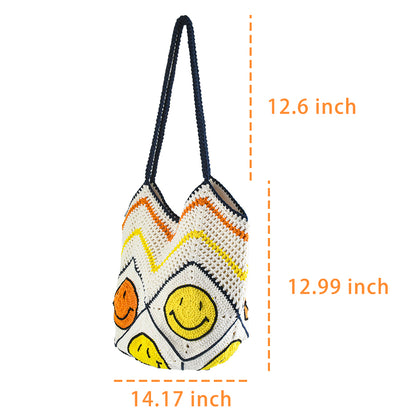 Handmade crochet tote bag with a white base, colorful chevron pattern, and three smiley face designs in orange, yellow, and navy. Features a soft navy strap and a spacious interior, perfect for casual outings or travel.