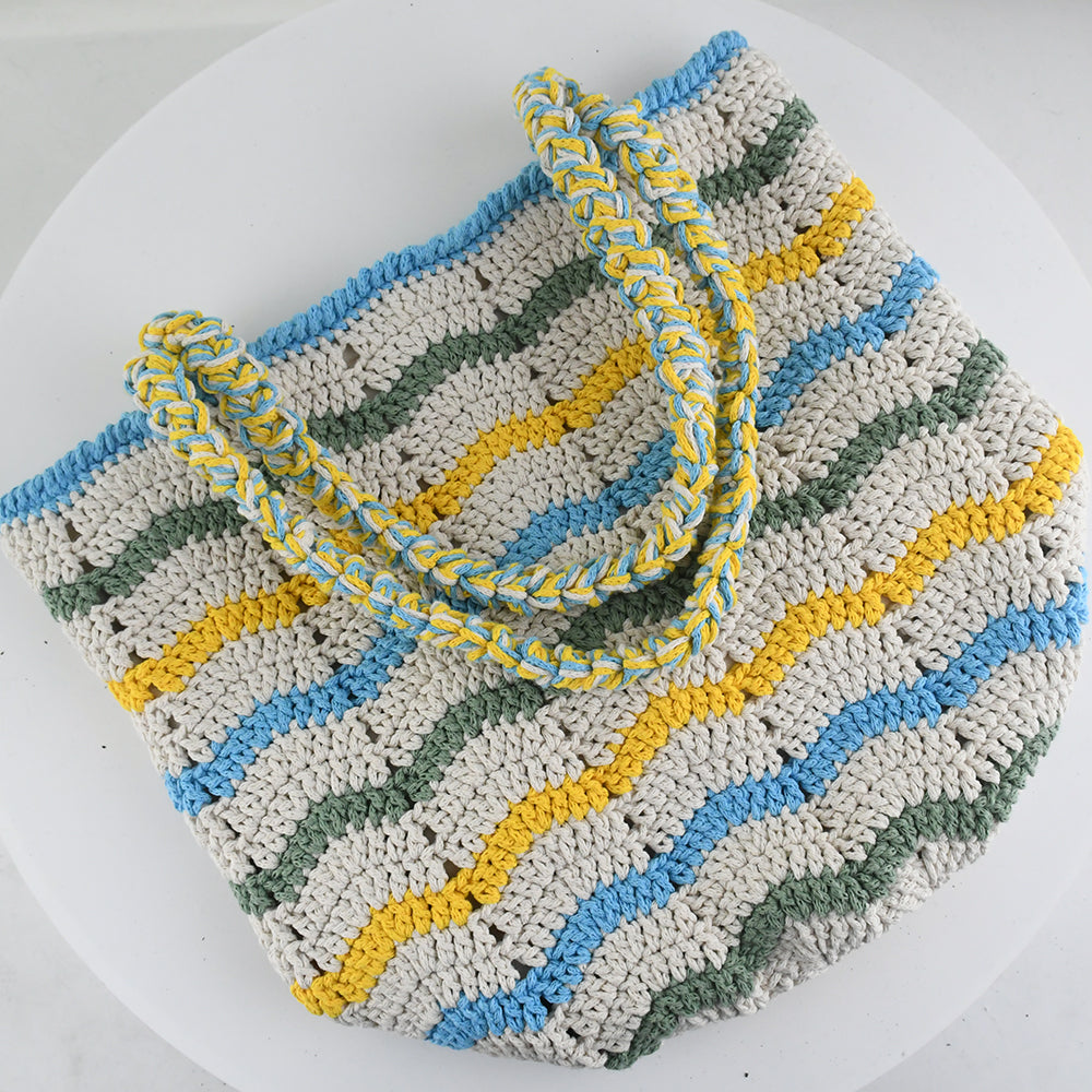 Handwoven crochet tote bag with colorful wave patterns in blue, yellow, green, and cream. Features a braided handle and lightweight, eco-friendly design. Perfect for everyday use, shopping, or beach trips.