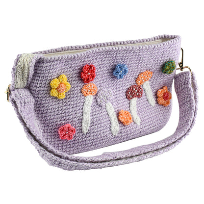 Handmade lavender crochet shoulder bag decorated with colorful mushrooms and flowers. Lightweight, eco-friendly, and perfect for daily use or travel.