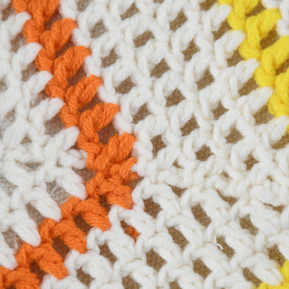 Handmade crochet tote bag with a white base, colorful chevron pattern, and three smiley face designs in orange, yellow, and navy. Features a soft navy strap and a spacious interior, perfect for casual outings or travel.