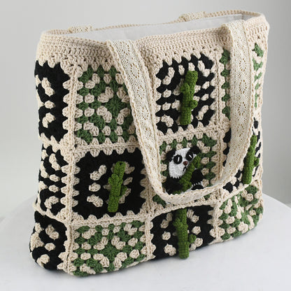 Handmade crochet patchwork bag with a beige, green, and black design. Features a cute panda and bamboo pattern in the center, vintage style, lightweight, and practical for shopping, travel, or daily use.