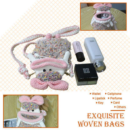Handcrafted pink crochet doll crossbody phone pouch with zipper closure and cute facial details
