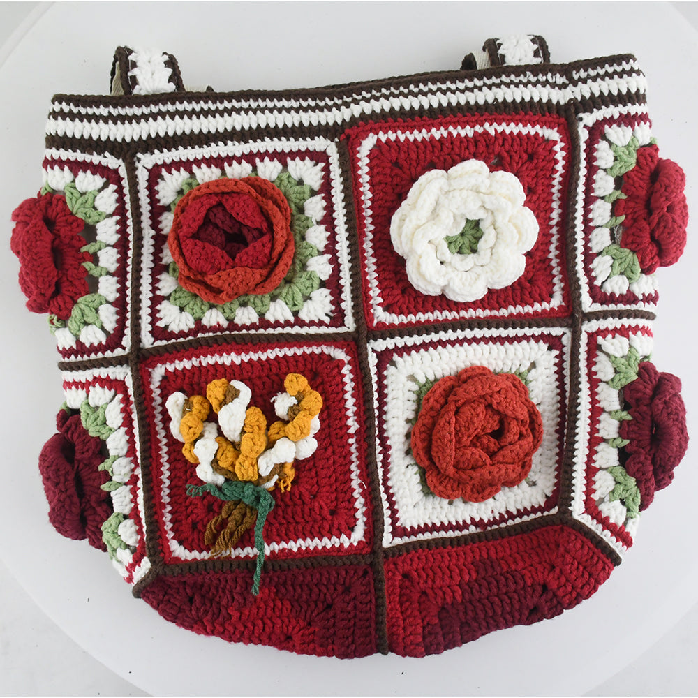 Handmade crochet tote bag featuring vibrant 3D floral patchwork in red, white, and green. Perfect for shopping, daily use, or as a stylish accessory.