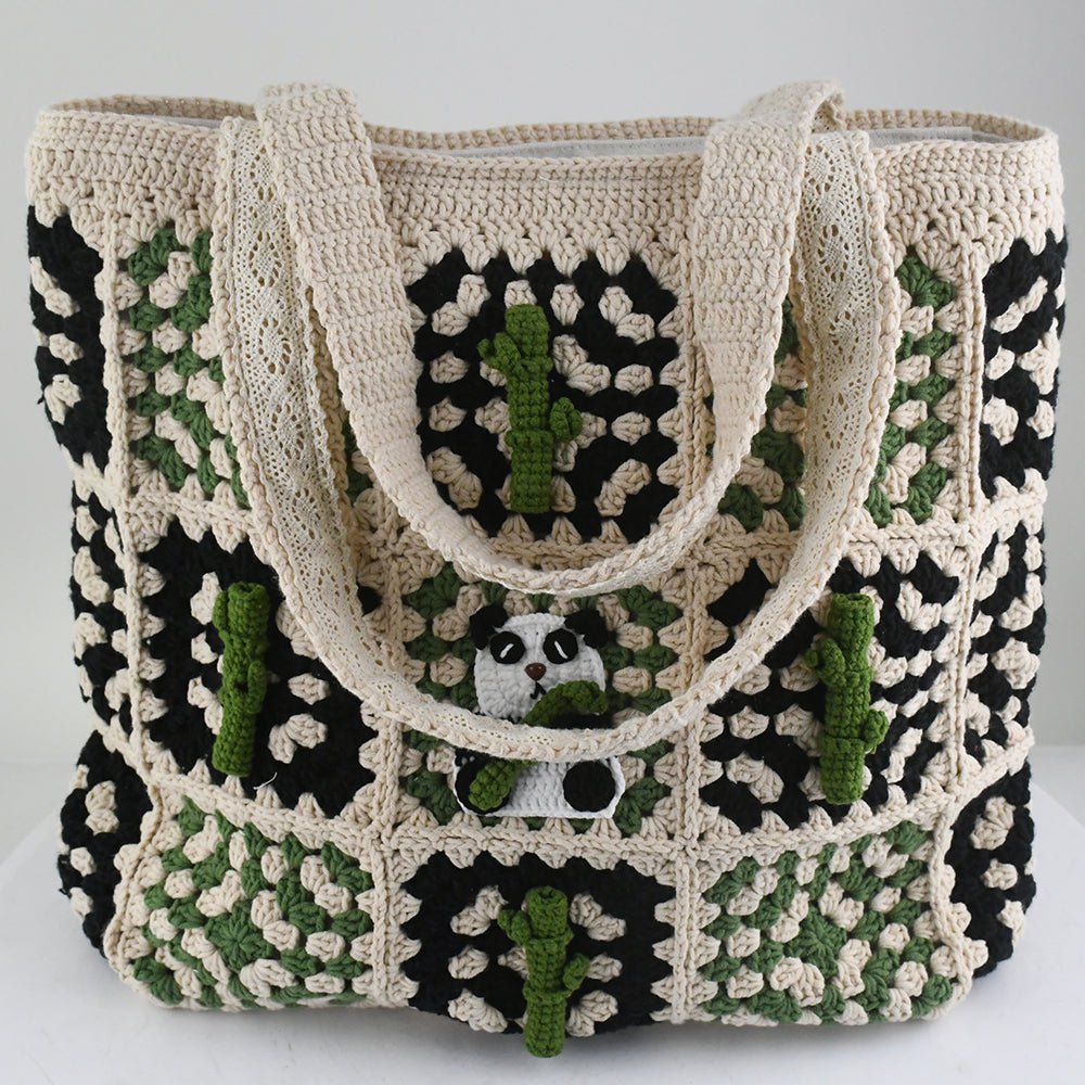 Handmade crochet patchwork bag with a beige, green, and black design. Features a cute panda and bamboo pattern in the center, vintage style, lightweight, and practical for shopping, travel, or daily use.