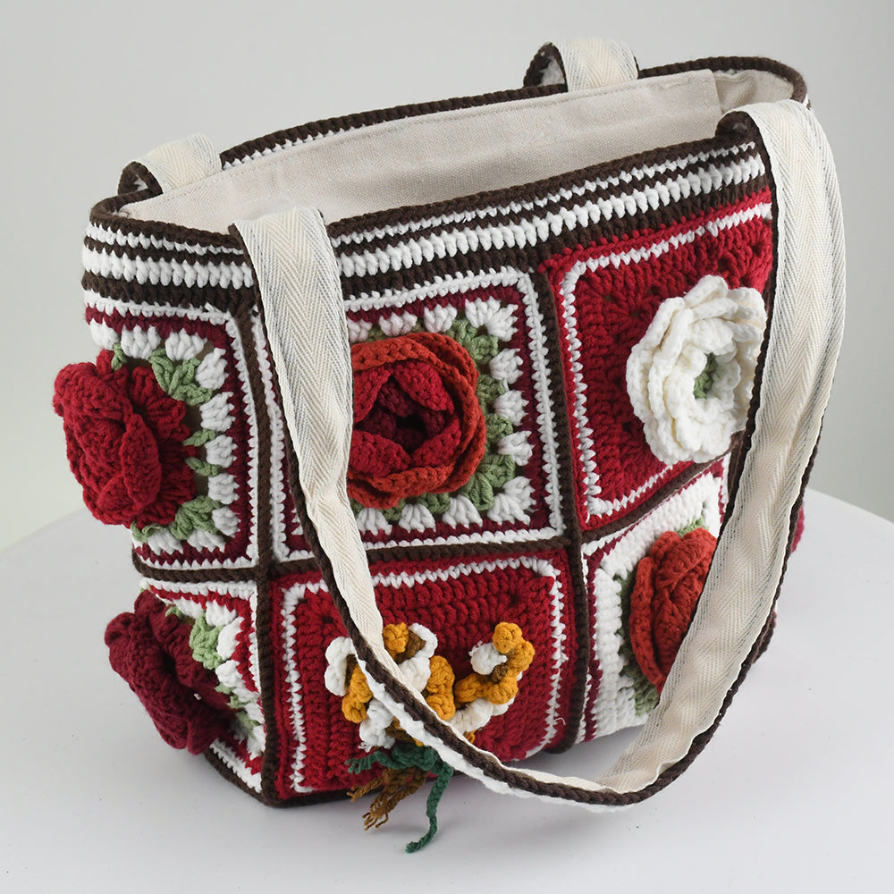 Handmade crochet tote bag featuring vibrant 3D floral patchwork in red, white, and green. Perfect for shopping, daily use, or as a stylish accessory.