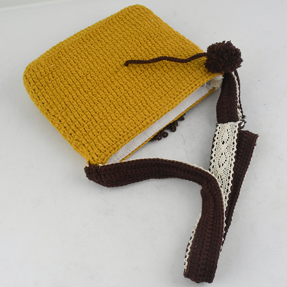 Handmade crochet lion face shoulder bag with a unique and adorable design, featuring yellow, brown, and white colors, lightweight and durable, perfect for animal lovers and creative fashion styles.