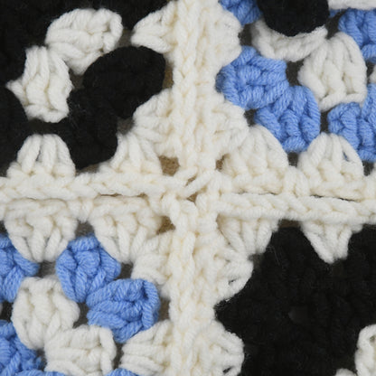 Handmade crochet tote bag featuring a panda design with bamboo patterns, blue and black square details, and a soft white base. Perfect for casual outings or eco-friendly shopping.