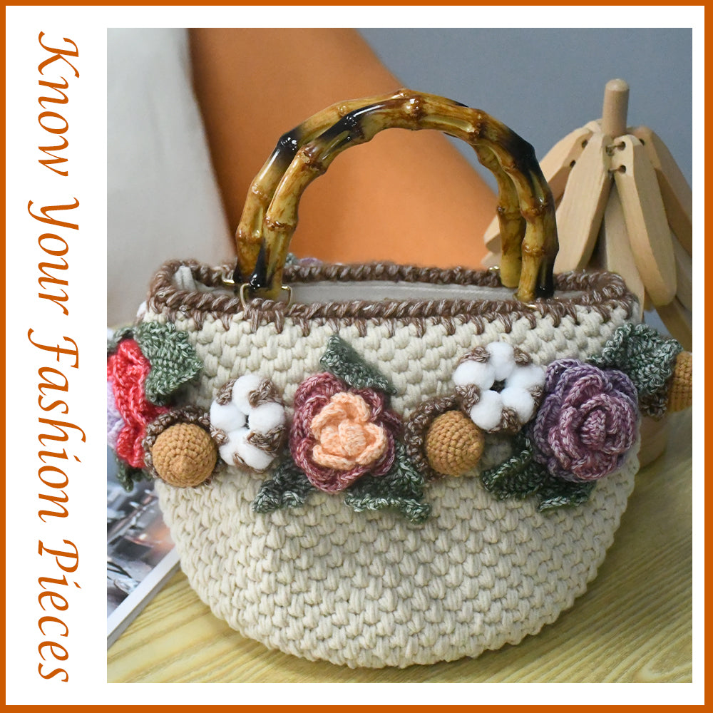 Handwoven cotton tote bag with bamboo handles, decorated with crochet flowers in pink, coral, purple and white cotton blooms, natural beige base