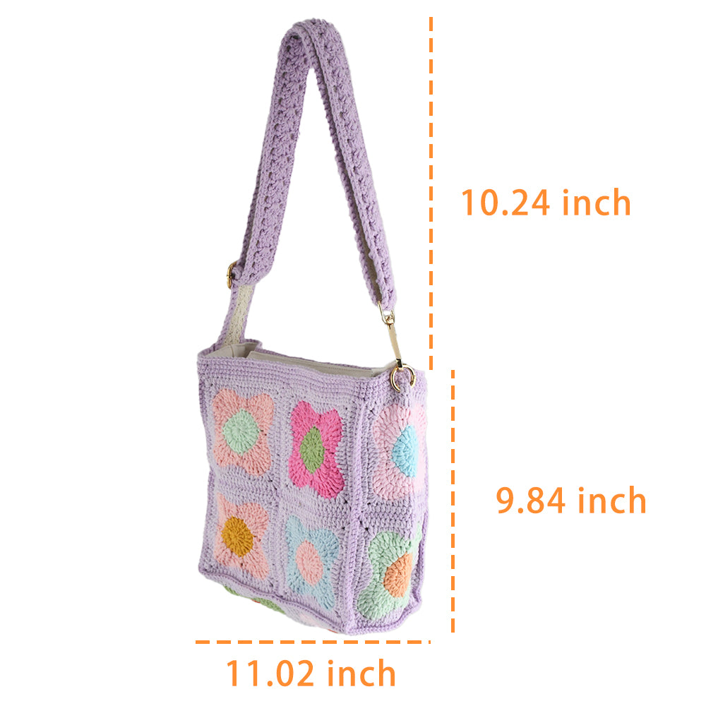 A handmade crochet shoulder bag with a lavender base and colorful floral square patterns. The bag features an adjustable and detachable strap, a soft texture, and a spacious interior, perfect for daily use or casual outings.